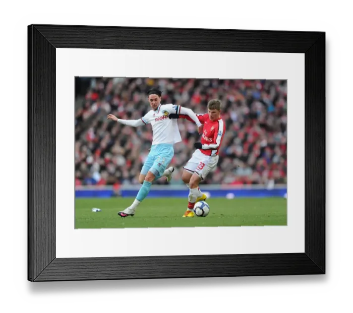 Framed Print : Andrey Arshavin (Arsenal) Chris Eagles (Burnley). Arsenal 3: 1 Burnley, Barclays Premier League Framed Print : Andrey Arshavin (Arsenal) Chris Eagles (Burnley). Arsenal 3: 1 Burnley, Barclays Premier League