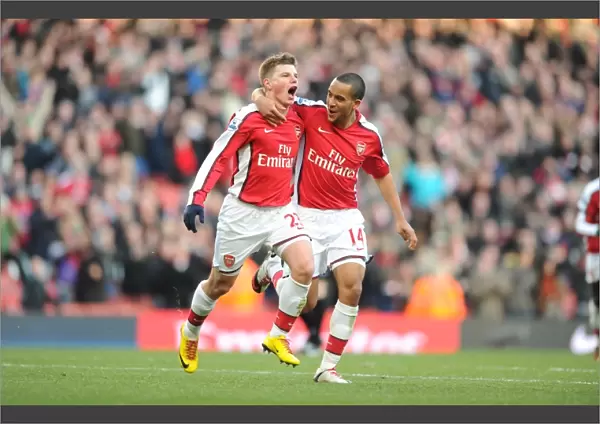 Andrey Arshavin celebrates scoring the 3rd Arsenal goal with Theo Walcott