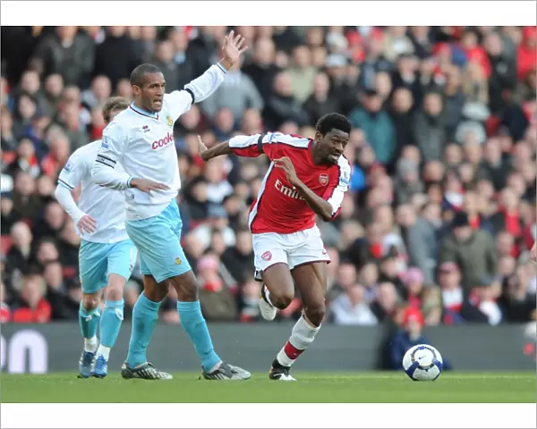 Abou Diaby (Arsenal) Clarke Carlisle (Burnley). Arsenal 3: 1 Burnley, Barclays Premier League