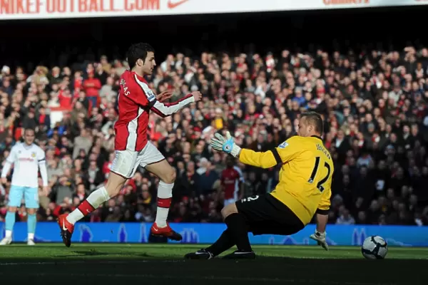 Cesc Fabregas shoots past Burnley goalkeeper to score the 1st Arsenal goal
