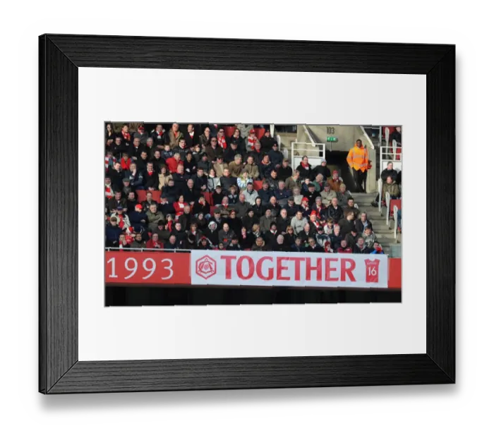 Framed Print : Arsenal Fans Rally Behind Injured Aaron Ramsey Amidst Arsenal's 3:1 Victory Over Burnley