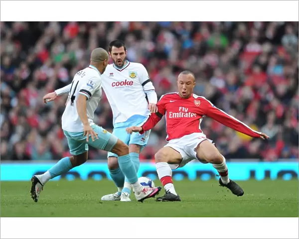 Mikael Silvestre (Arsenal) Steven Thompson and Tyrone Mears (Burnley). Arsenal 3
