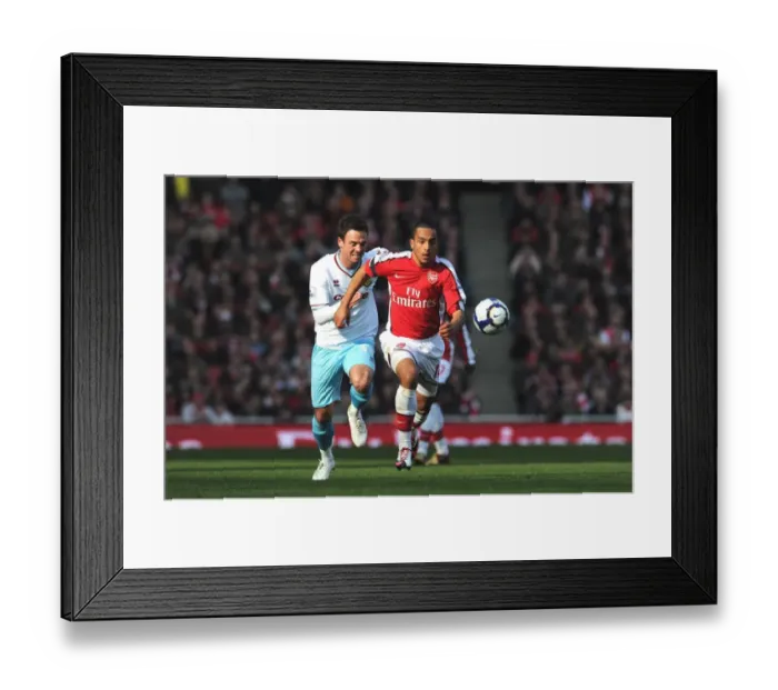 Framed Print : Theo Walcott Scores Against Daniel Fox: Arsenal's 3-1 Victory Over Burnley, Barclays Premier League, Emirates Stadium Framed Print : Theo Walcott Scores Against Daniel Fox: Arsenal's 3-1 Victory Over Burnley, Barclays Premier League, Emirates Stadium