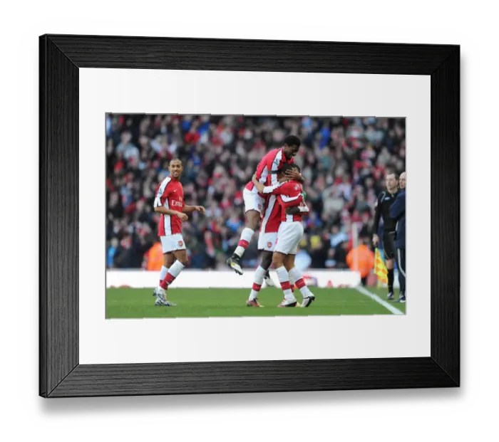 Framed Print : Theo Walcott's Double: Arsenal Celebrates with Eboue, Diaby, and Clichy (3-1 vs Burnley, 2010)