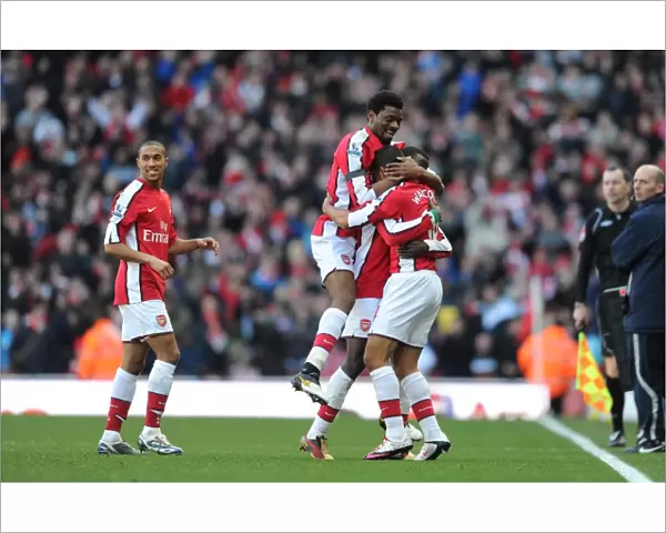 Theo Walcott celebrates scoring the 2nd Arsenal goal with Emmanuel Eboue