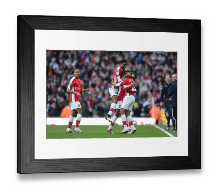 Framed Print : Theo Walcott celebrates scoring the 2nd Arsenal goal with Emmanuel Eboue