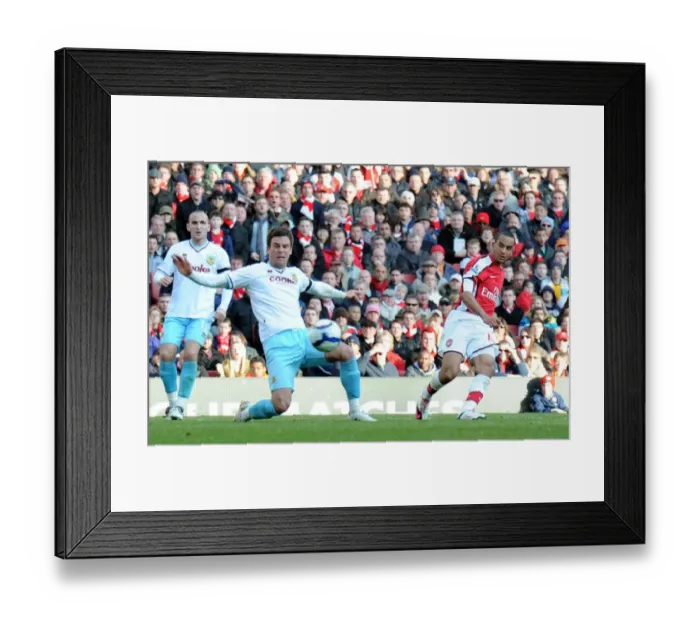 Framed Print : Theo Walcott shoots past Burnley goalkeeper Brian Jensen to score the 2nd Arsenal goal Framed Print : Theo Walcott shoots past Burnley goalkeeper Brian Jensen to score the 2nd Arsenal goal