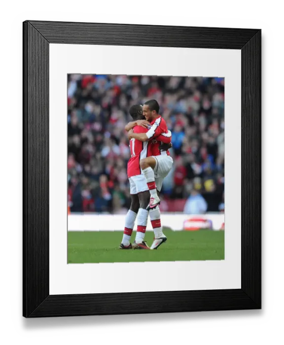 Framed Print : Theo Walcott and Emmanuel Eboue: Celebrating Arsenal's 3-1 Victory Over Burnley Framed Print : Theo Walcott and Emmanuel Eboue: Celebrating Arsenal's 3-1 Victory Over Burnley