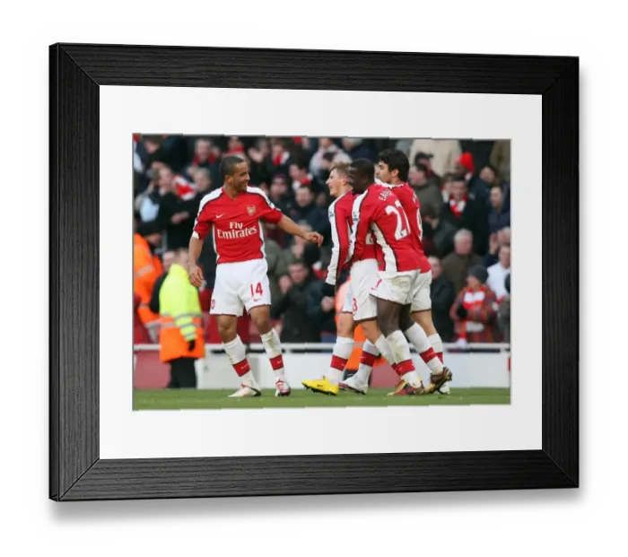 Framed Print : Andrey Arshavin celebrates scoring Arsenals 3rd goal with Eduardo