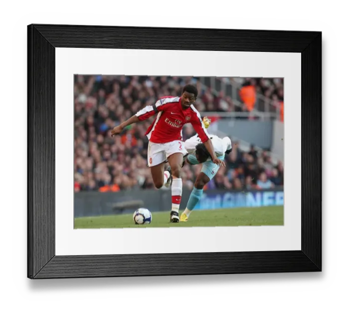 Framed Print : Abou Diaby (Arsenal) Andre Bikey (Burnley). Arsenal 3: 1 Burnley. Barclays Premier League Framed Print : Abou Diaby (Arsenal) Andre Bikey (Burnley). Arsenal 3: 1 Burnley. Barclays Premier League