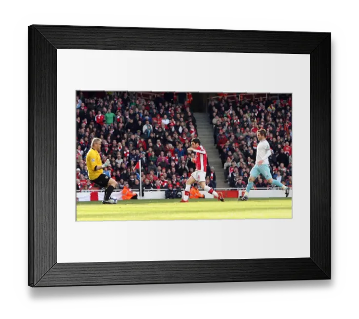 Framed Print : Cesc Fabregas scores Arsenals 1st goal past Brian Jensen (Burnley)