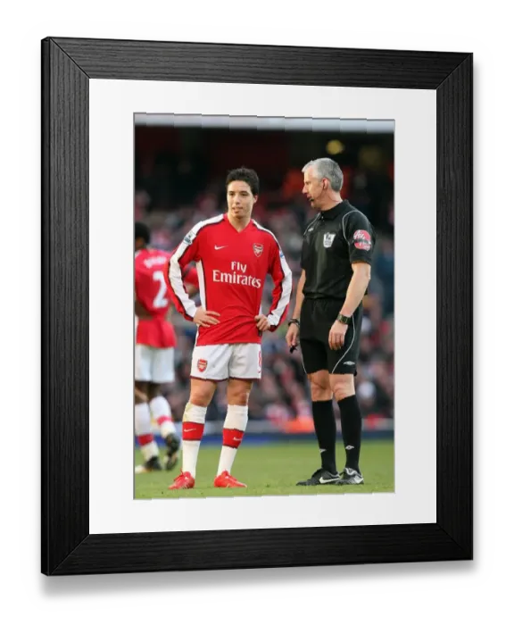 Framed Print : Samir Nasri (Arsenal) chats to Referee Chris Foy. Arsenal 3: 1 Burnley. Barclays Premier League