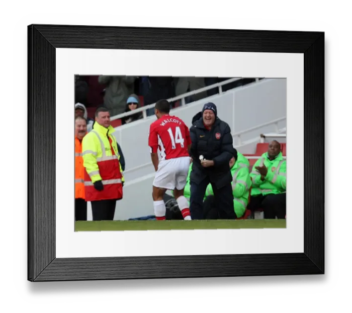 Framed Print : Theo Walcott celebrates scoring Arsenals 2nd goal with Paul Johnson