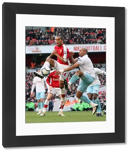 Theo Walcott (Arsenal) Tyrone Mears (Burnley). Arsenal 3: 1 Burnley. Barclays Premier League
