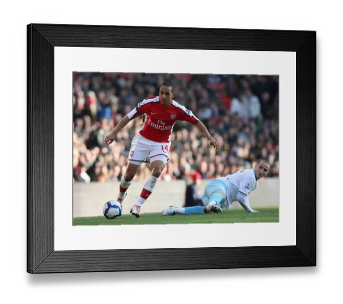 Framed Print : Theo Walcott (Arsenal) Martin Paterson (Burnley). Arsenal 3: 1 Burnley. Barclays Premier League Framed Print : Theo Walcott (Arsenal) Martin Paterson (Burnley). Arsenal 3: 1 Burnley. Barclays Premier League