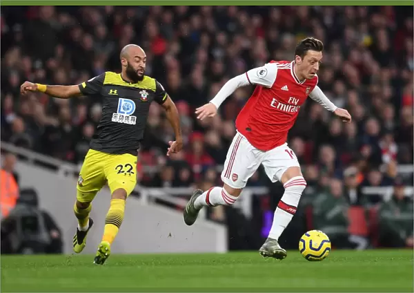 Arsenal's Ozil Clashes with Southampton's Redmond in Premier League Showdown