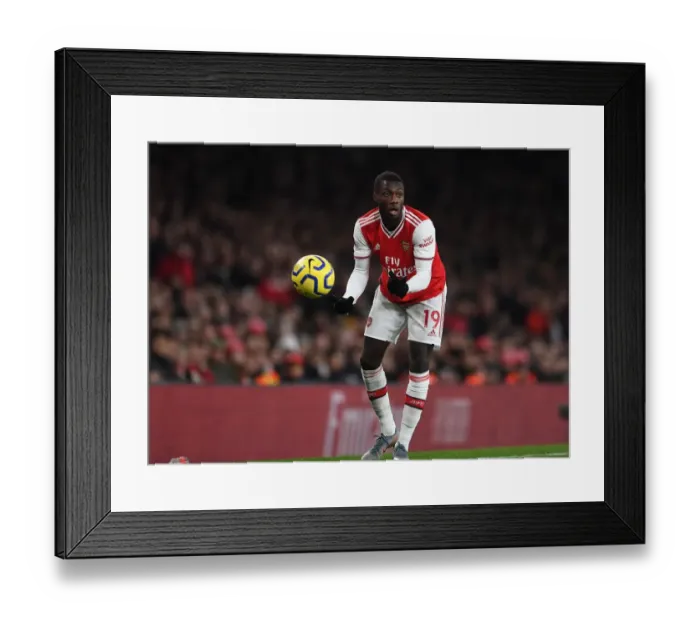 Framed Print : Arsenal's Nicolas Pepe in Action against Southampton in the Premier League
