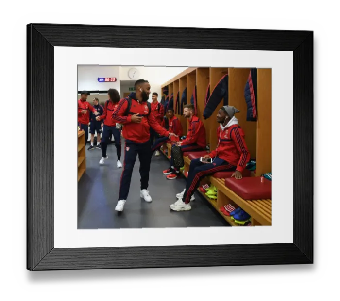 Framed Print : Arsenal FC: Pre-Match Huddle - Lacazette and Maitland-Niles in the Changing Room (Arsenal v Southampton, 2019-20)