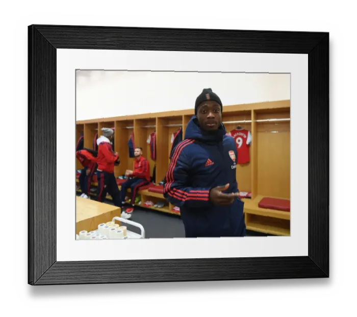 Framed Print : Pepe's Focus and Determination: Arsenal Changing Room Moment before Arsenal vs Southampton