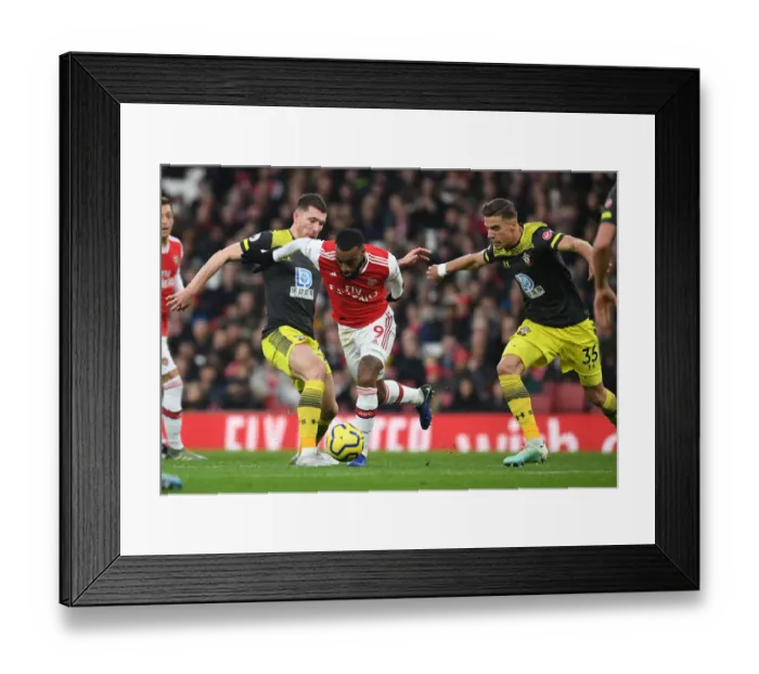 Framed Print : Arsenal's Lacazette Clashes with Southampton's Hojbjerg and Bednarek during the 2019-20 Premier League Match