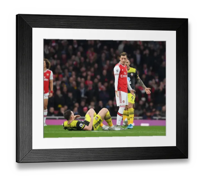 Framed Print : Arsenal vs Southampton: Ozil and Hojbjerg Clash in Premier League Showdown