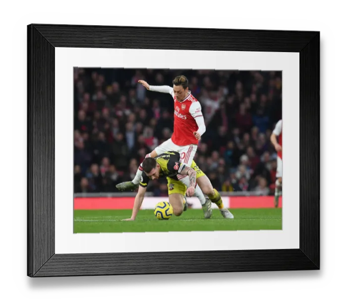 Framed Print : Arsenal vs Southampton: Ozil vs Hojbjerg Clash in Premier League Showdown Framed Print : Arsenal vs Southampton: Ozil vs Hojbjerg Clash in Premier League Showdown