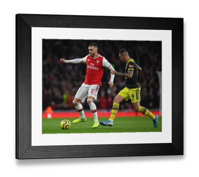 Framed Print : Arsenal vs Southampton: Calum Chambers vs Danny Ings Clash in Premier League Showdown Framed Print : Arsenal vs Southampton: Calum Chambers vs Danny Ings Clash in Premier League Showdown
