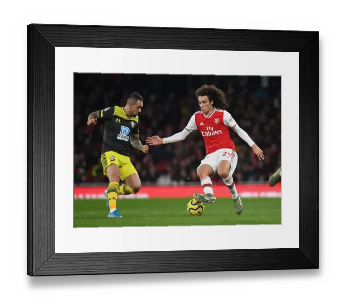Framed Print : Guendouzi vs. Ings: A Premier League Showdown at Emirates Stadium