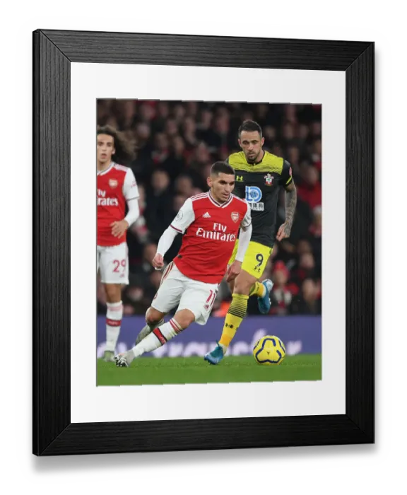 Framed Print : Arsenal's Torreira Outmaneuvers Southampton's Ings in Premier League Clash Framed Print : Arsenal's Torreira Outmaneuvers Southampton's Ings in Premier League Clash