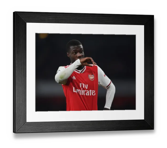 Framed Print : Arsenal's Nicolas Pepe Shines in Premier League Clash Against Southampton