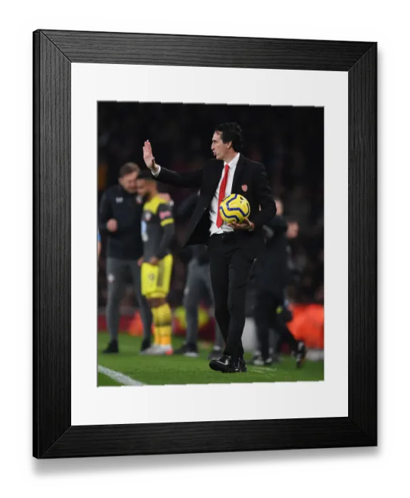 Framed Print : Unai Emery's Determination: Arsenal vs. Southampton - Premier League Clash at Emirates Stadium