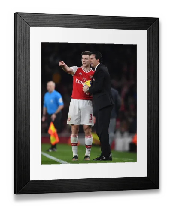 Framed Print : Unai Emery and Kieran Tierney: Strategic Talks on the Arsenal Touchline during Southampton Match