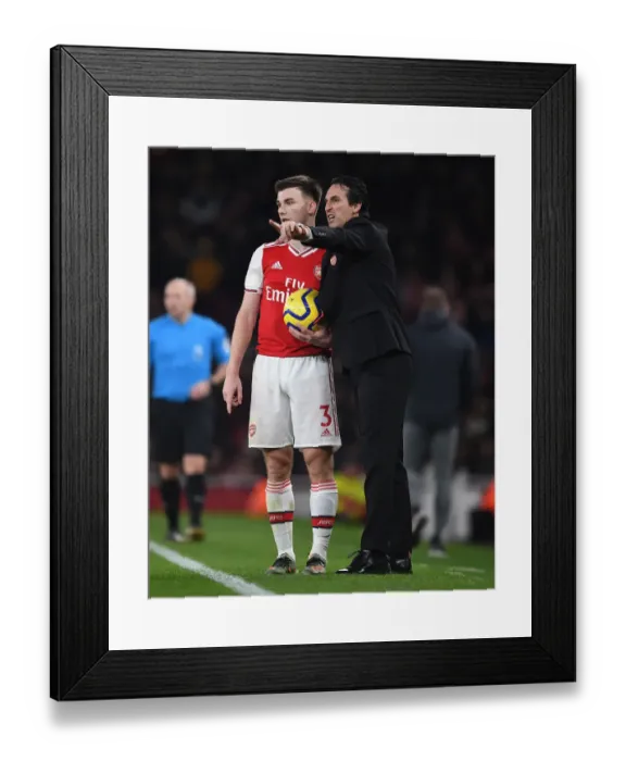 Framed Print : Strategic Discussions: Unai Emery and Kieran Tierney at Arsenal's Emirates Stadium
