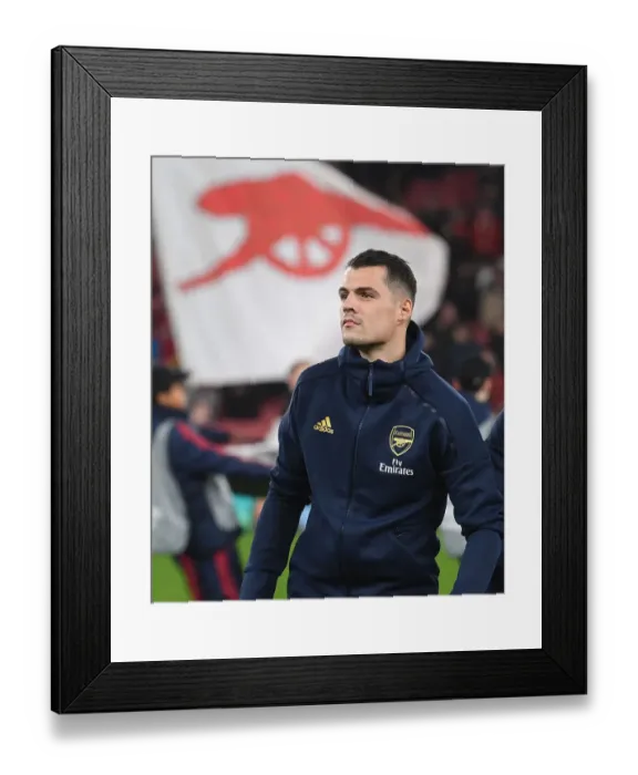 Framed Print : Arsenal's Granit Xhaka Prepares for Eintracht Frankfurt Clash in Europa League Group Stage