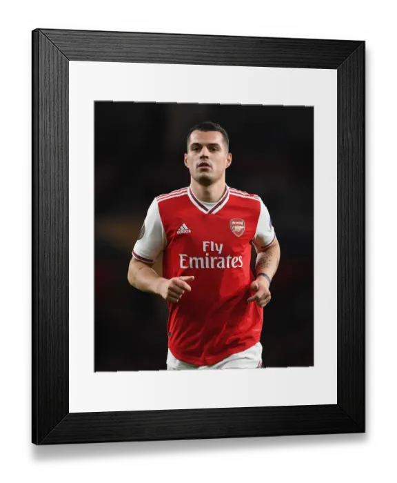 Framed Print : Granit Xhaka in Action: Arsenal's Europa League Clash vs Eintracht Frankfurt Framed Print : Granit Xhaka in Action: Arsenal's Europa League Clash vs Eintracht Frankfurt