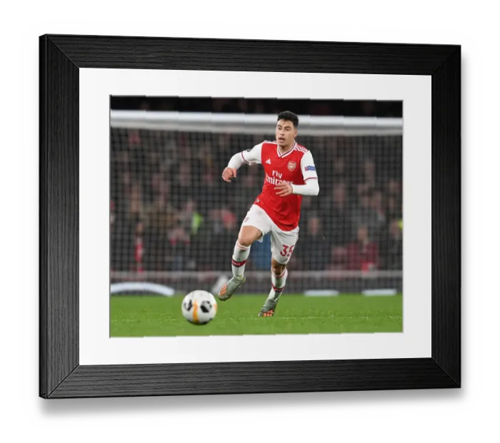 Framed Print : Martinelli Makes Europa League Debut: Arsenal's New Star Shines Against Eintracht Frankfurt