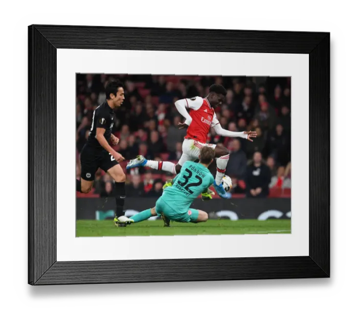 Framed Print : Arsenal vs Eintracht Frankfurt: Bukayo Saka Clash in Europa League Group F Framed Print : Arsenal vs Eintracht Frankfurt: Bukayo Saka Clash in Europa League Group F