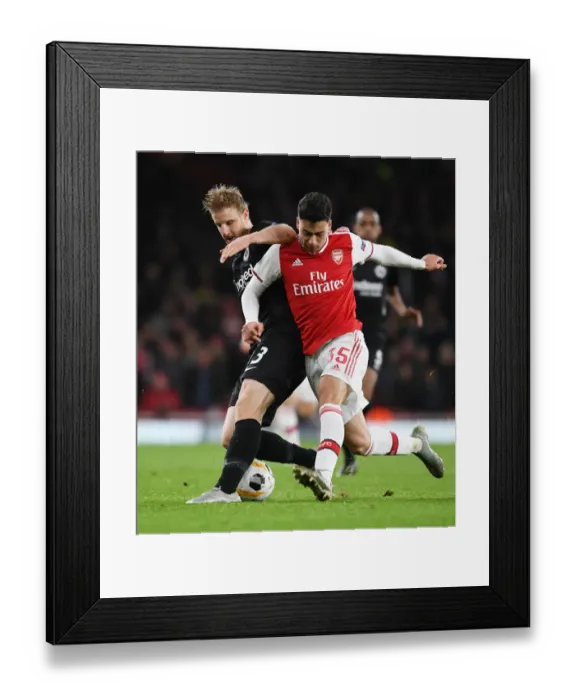 Framed Print : Guendouzi vs. Hinteregger: Clash of the Midfielders in Arsenal vs. Eintracht Frankfurt Europa League Match