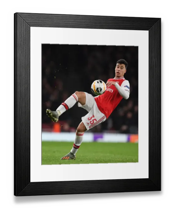 Framed Print : Arsenal's Martinelli Shines in Europa League Clash Against Eintracht Frankfurt