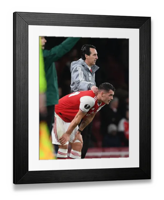 Framed Print : Arsenal's Unai Emery and Granit Xhaka: Leading the Team to Victory against Eintracht Frankfurt in the Europa League Framed Print : Arsenal's Unai Emery and Granit Xhaka: Leading the Team to Victory against Eintracht Frankfurt in the Europa League