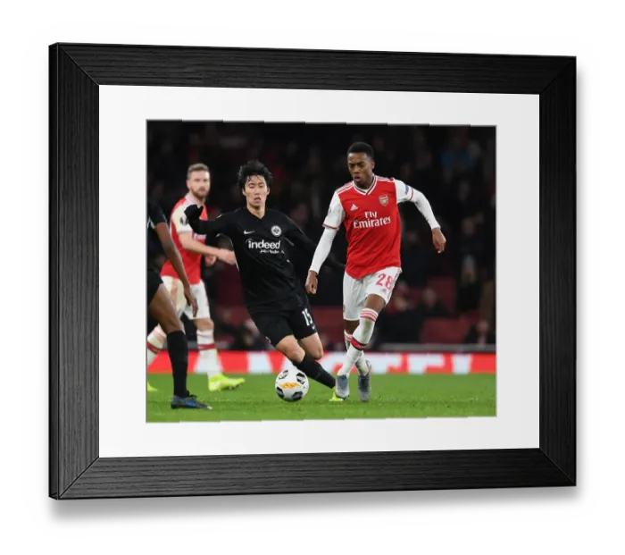 Framed Print : Arsenal's Joe Willock Outwits Makoto Hasebe: Europa League Victory Moment