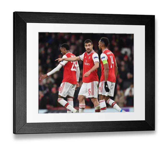 Framed Print : Arsenal's Sokratis and Aubameyang Face Off Against Eintracht Frankfurt in Europa League Clash Framed Print : Arsenal's Sokratis and Aubameyang Face Off Against Eintracht Frankfurt in Europa League Clash