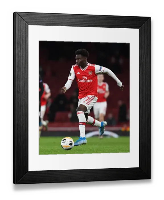 Framed Print : Arsenal's Bukayo Saka in Action: Arsenal FC vs Eintracht Frankfurt, UEFA Europa League 2019-20
