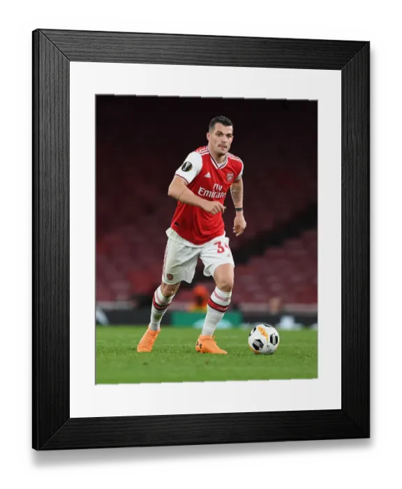 Framed Print : Granit Xhaka's Europa League Showdown: Arsenal vs. Eintracht Frankfurt Framed Print : Granit Xhaka's Europa League Showdown: Arsenal vs. Eintracht Frankfurt