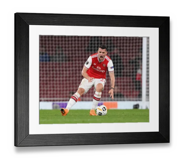 Framed Print : Granit Xhaka's Europa League Showdown: Arsenal vs. Eintracht Frankfurt