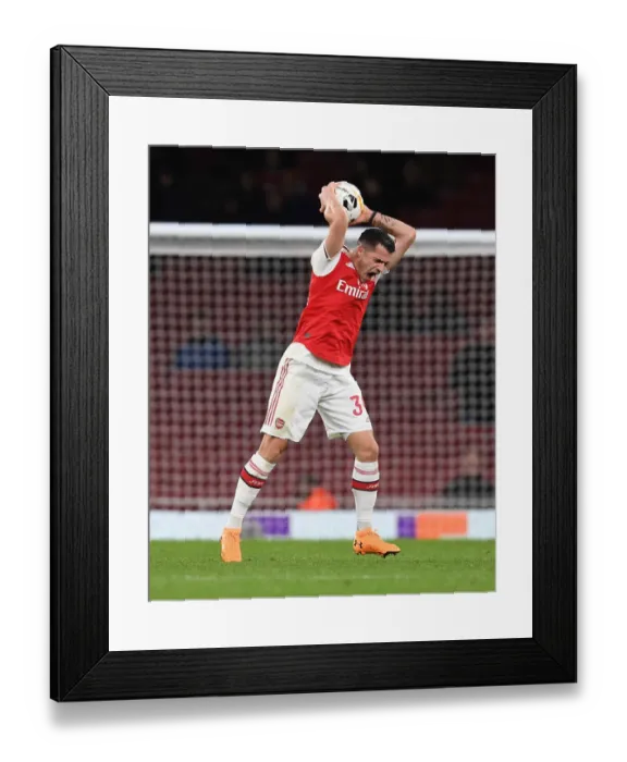 Framed Print : Granit Xhaka's Europa League Showdown: Arsenal vs. Eintracht Frankfurt