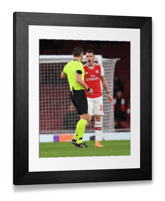 Framed Print : Arsenal's Xhaka Booked in Europa League Clash Against Eintracht Frankfurt Framed Print : Arsenal's Xhaka Booked in Europa League Clash Against Eintracht Frankfurt