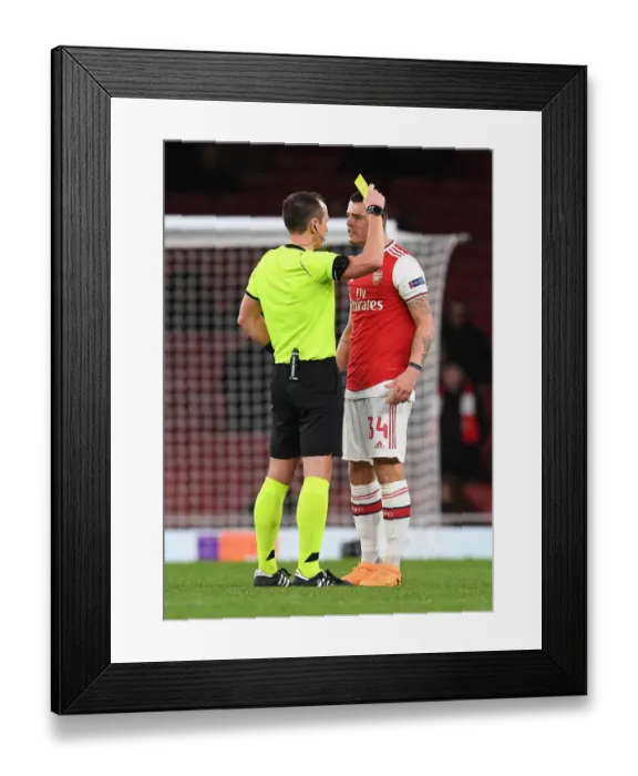 Framed Print : Arsenal's Xhaka Booked in Europa League Clash Against Eintracht Frankfurt Framed Print : Arsenal's Xhaka Booked in Europa League Clash Against Eintracht Frankfurt