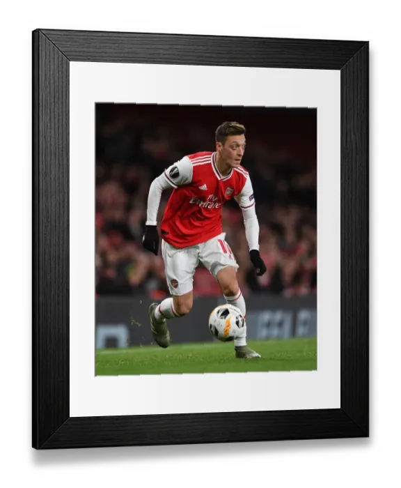 Framed Print : Arsenal's Ozil Shines in Europa League Clash Against Eintracht Frankfurt