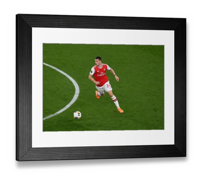 Framed Print : Granit Xhaka's Europa League Showdown: Arsenal vs. Eintracht Frankfurt